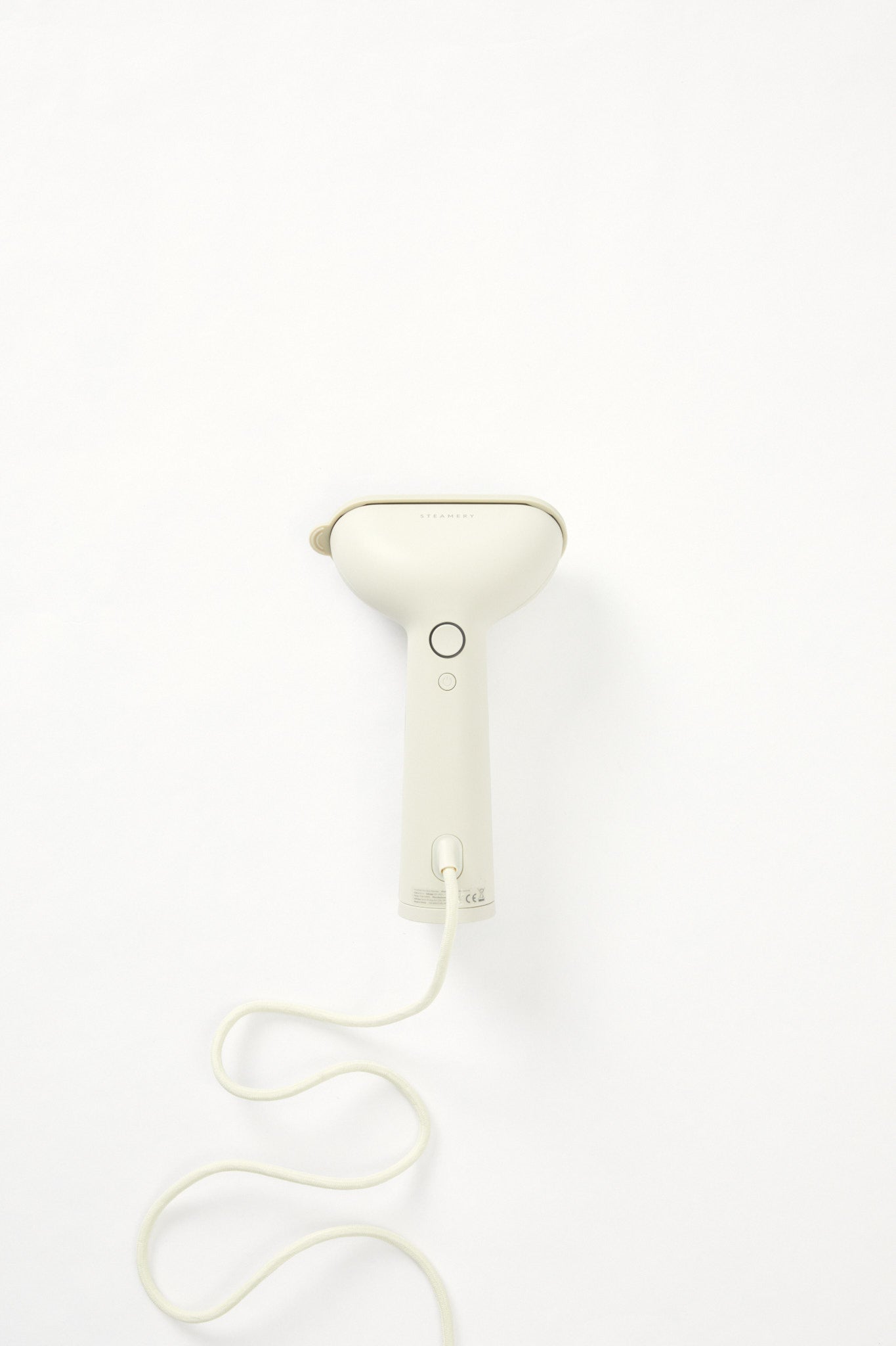 Mint green coloured clothes steamer by Steamery Stockholm. A